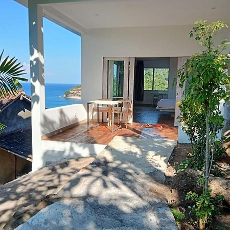 Wawa Wewe Rock Otel Amed Dış mekan fotoğraf