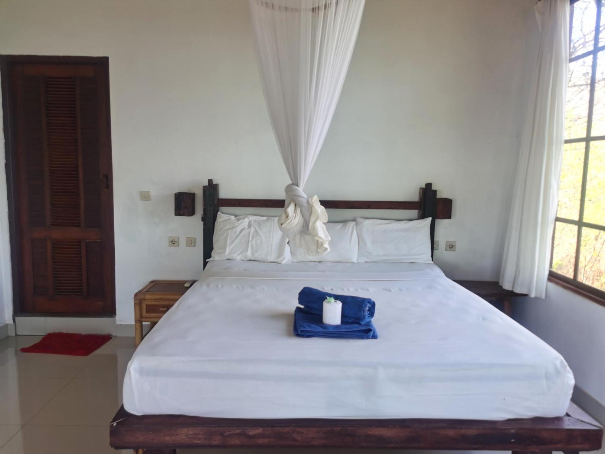 Wawa Wewe Rock Otel Amed Dış mekan fotoğraf